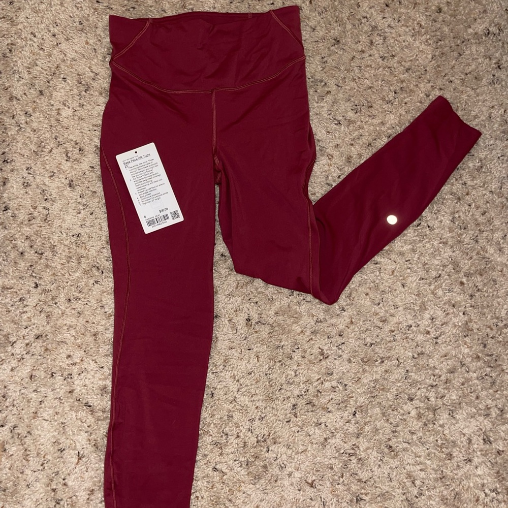 Lululemon Base Pace HR tight 25” size 6